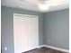 Well-lit bedroom with a ceiling fan and a double door closet, offering ample space at 310 Day Break Cir, Port Charlotte, FL 33954