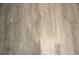 Close up on the wood-look flooring, a durable and elegant choice for any home at 310 Day Break Cir, Port Charlotte, FL 33954