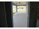 Spacious screened-in porch offering views of the backyard and a comfortable outdoor living space at 310 Day Break Cir, Port Charlotte, FL 33954
