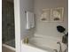 Spa-like bathroom with soaking tub, walk-in shower, and stylish decor at 1139 Euclid Rd, Venice, FL 34293