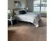 Bright and airy bedroom with comfortable queen-size bed at 1139 Euclid Rd, Venice, FL 34293