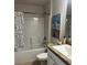 Clean bathroom with tub shower combo and updated vanity at 1139 Euclid Rd, Venice, FL 34293