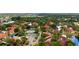 Aerial view of community with pool, tennis courts, and location highlighted at 4450 47Th W Ave # 202, Bradenton, FL 34210
