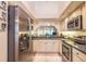 Kitchen with stainless steel appliances and granite countertops at 4450 47Th W Ave # 202, Bradenton, FL 34210