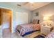 Small bedroom with twin bed and built-in storage at 4450 47Th W Ave # 202, Bradenton, FL 34210