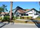 Charming home exterior featuring a clay tile roof and attractive landscaping, presenting curb appeal at 4450 47Th W Ave # 202, Bradenton, FL 34210