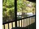 Balcony view overlooking a tranquil pond and trees at 4450 47Th W Ave # 202, Bradenton, FL 34210