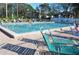 Shorewalk community lap pool with lounge chairs to relax at 4450 47Th W Ave # 202, Bradenton, FL 34210