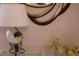Entryway with table lamp, mirror, and decorative figurines at 4450 47Th W Ave # 202, Bradenton, FL 34210