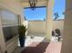 Cozy courtyard with elegant lighting, seating, and serene landscaping, perfect for relaxation at 4989 Clubview E Ct, Bradenton, FL 34203