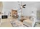 This open living area boasts plenty of natural light and flows seamlessly into the adjacent dining area at 4989 Clubview E Ct, Bradenton, FL 34203