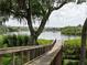 Wooden boardwalk path to river access at 11826 River Shores Trl, Parrish, FL 34219