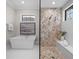 Spa-like bathroom with a large soaking tub and walk-in shower at 11826 River Shores Trl, Parrish, FL 34219