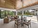 Relaxing lanai with pool views and wooden ceiling at 11826 River Shores Trl, Parrish, FL 34219