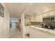 Kitchen with granite countertops and stainless steel appliances at 9011 Midnight Pass Rd # 228, Sarasota, FL 34242