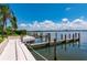 Private walkway to the community dock offering waterfront access at 9011 Midnight Pass Rd # 228, Sarasota, FL 34242