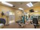 Well-equipped fitness center with various cardio and weight training machines at 9011 Midnight Pass Rd # 228, Sarasota, FL 34242