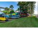 Community kayak storage with numerous kayaks available for use at 9011 Midnight Pass Rd # 228, Sarasota, FL 34242