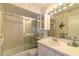 Clean bathroom with a shower/tub combo, updated vanity at 9011 Midnight Pass Rd # 228, Sarasota, FL 34242