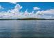 Scenic waterfront view with lush mangrove islands and clear skies at 9011 Midnight Pass Rd # 228, Sarasota, FL 34242