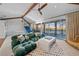 Playroom with waterfront views, sectional sofa, and game features at 535 70Th St, Holmes Beach, FL 34217