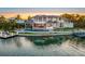 Stunning waterfront property featuring a large pool and private dock at 535 70Th St, Holmes Beach, FL 34217