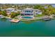Luxury waterfront home with private dock and beautiful landscaping at 535 70Th St, Holmes Beach, FL 34217