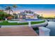 Expansive backyard with a large pool and private dock access at 535 70Th St, Holmes Beach, FL 34217