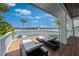 Relaxing balcony with lounge chairs and stunning waterfront views at 535 70Th St, Holmes Beach, FL 34217