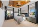 Stylish bedroom with a built-in workspace and a ceiling fan at 535 70Th St, Holmes Beach, FL 34217