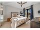 Bright bedroom with a queen-size bed and access to a private balcony at 535 70Th St, Holmes Beach, FL 34217