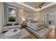 Spacious bedroom with sitting area and water views at 535 70Th St, Holmes Beach, FL 34217