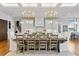Formal dining room with large table and chandelier at 535 70Th St, Holmes Beach, FL 34217