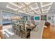 Elegant dining room with large table, chandelier, and water views at 535 70Th St, Holmes Beach, FL 34217