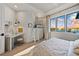 Bright bedroom with built-in bunk beds, a desk, and stunning water views at 535 70Th St, Holmes Beach, FL 34217