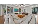 Living room with fireplace and large sectional sofa at 535 70Th St, Holmes Beach, FL 34217