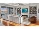 Spacious living area with a fireplace and built-in shelving at 535 70Th St, Holmes Beach, FL 34217