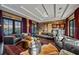 Spacious living area with a comfortable seating arrangement, hardwood floors, and water views at 535 70Th St, Holmes Beach, FL 34217
