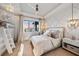 Spacious bedroom with a large window, a built-in bunk bed, and an ensuite bathroom at 535 70Th St, Holmes Beach, FL 34217