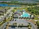 Community pool, pickleball courts, and playground visible from above at 17009 Peaceful Valley Dr, Wimauma, FL 33598