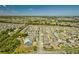 Aerial view of Vista Palms community, showing homes, pool, and surrounding area at 17009 Peaceful Valley Dr, Wimauma, FL 33598