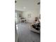 Bright office space with natural light, comfortable seating, and ample desk space at 1590 Royal Rd, Venice, FL 34293
