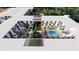 Aerial view of building showing pool and courtyard at 2170 Robinhood Street # A4-301, Sarasota, FL 34231