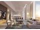 Open concept living space with modern furnishings and fireplace at 430 Kumquat Ct # 404, Sarasota, FL 34236