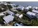 Aerial view of a charming beach cottage with a spacious backyard at 106 11Th S St # A, Bradenton Beach, FL 34217