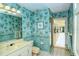 Bathroom with shower access and updated vanity at 7812 Broadmoor Pines Blvd, Sarasota, FL 34243