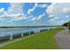 Scenic park trail alongside a lake with a walking path at 7812 Broadmoor Pines Blvd, Sarasota, FL 34243
