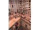Custom-built wine cellar with ample storage for wine bottles and accessories at 1130 Anclote Rd, Tarpon Springs, FL 34689