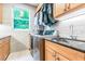 Bright laundry room, featuring modern appliances and ample storage at 1130 Anclote Rd, Tarpon Springs, FL 34689