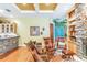 Relaxing sitting area with leather armchairs near a stone wet bar at 1130 Anclote Rd, Tarpon Springs, FL 34689